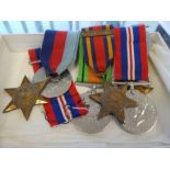 A World War II Medal group of 6 medals to include 2 x War Medal, Defence Medal, 1939 - 45 Star x 2,