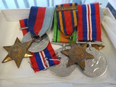 A World War II Medal group of 6 medals to include 2 x War Medal, Defence Medal, 1939 - 45 Star x 2,