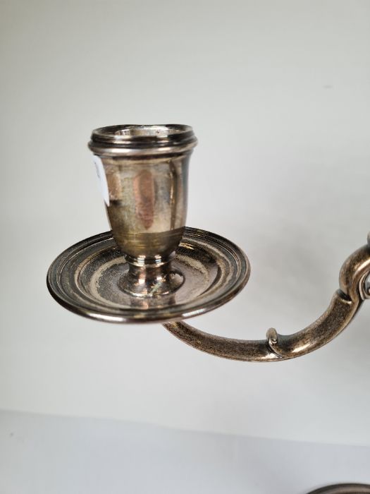 A pair of heavy silver candleabras, not weighted having two branches. On a circular pedestal foot an - Image 3 of 4