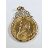 22ct gold 1oz Krugerrand dated 1975 in 9ct yellow gold pendant mount marked 375, maker WJP, approx 3