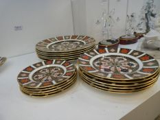 A quantity of Royal Crown Derby Old Imari pattern plates, including 6 dinner and 11 others
