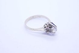 18ct white gold Solitaire diamond ring with raised approx 0.10 carat diamond in 6 claw mount, marked