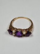9ct yellow gold dress ring with 3 large round cut amethyst and seed pearls, AF, one missing, approx