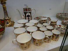 A quantity of Royal Crown Derby Old Imari Pattern coffee and teaware including 12 cups, cream jugs a