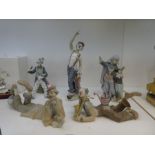 Five various Lladro clowns to include two lying examples and one with cats in a hat (boxed)