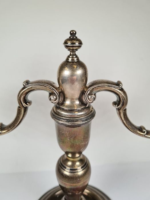 A pair of heavy silver candleabras, not weighted having two branches. On a circular pedestal foot an - Image 2 of 4