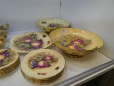 A pair of Aynsley circular fruit bowls by D Jones decorated grapes and peaches, 26cm