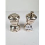 A silver salt and pepper stamped Tiffany and Co., Sterling. Also stamped Italy, Pampaloni Ermindo di