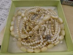 Quantity of pearl and simulated pearl necklaces