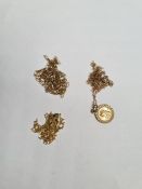 Two fine 9ct yellow gold chains, one hung with small gold St Christoper, marked 375, approx 2.27g
