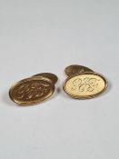 Pair of 9ct gold oval cufflinks, the larger panel inscribed RJF, marked 375, 2.5cm, approx 11.91g