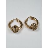 Pair of 9ct yellow gold hoop earrings half twisted front, marked 375, each hung with 9ct gold balls
