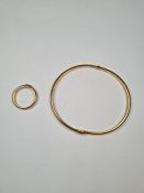 9ct yellow gold hinged bangle marked 375, 6cm diameter, maker DC? and a matching ring, size M