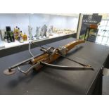 A bespoke handmade replica 15th century crossbow, operated by Goats foot Spanning Cocking lever, wit