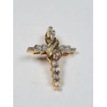 18ct yellow gold diamond inset cross pendant with central crossover design inset graduated round cut