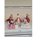 Five Royal Doulton figures to include 'Top of the Hill', 'Autumn Breezes' and 'Day Dreams' (5)