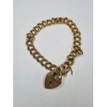 9ct yellow gold bracelet with heart shaped clasp and safety chain AF, marked 375, London maker LC, 1