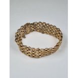 Pretty 9ct yellow gold fancy link bracelet, with safety chain, marked 375, maker NK, approx 20.09g