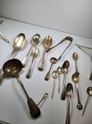 A quantity of silver flatware comprising of mostly Victorian and Georgian pieces to include a pair o