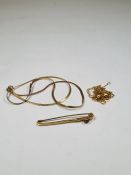 Three 9ct yellow gold necklaces, all marked and a 9ct gold bar brooch. Set with a round cut gemstone