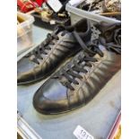 Men's Black Versace Trainers in black leather with metal eyelets, size 41.  These are lace up black