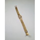 9ct yellow gold 'R. Hinds' ladies cocktail watch with textured strap, case and strap marked 375, app