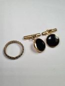 Pair of 9ct gold cufflinks set with black circular panels, marked 375 London import marks, maker OL,