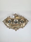 An ornate Henry Wilkinson and Co silver oval Victorian inkstand. Pretty embossed details, scroll bor