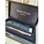 A cased Yard-o-led silver pen having decorative engraved details hallmarked Birmingham 1990. Cased i