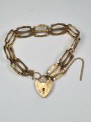 9ct yellow gold 3 bar gate link bracelet, with safety chain and heart shaped clasp 375, London maker