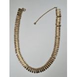 9ct gold fringe necklace, comprising rectangular textured panels, approx 40cm, with safety chain, ma