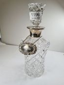 A high quality pretty cut glass decanter having silver neck by Robert and Dere Ltd, London 1989 with