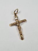 Unmarked yellow metal crucifix pendant, inscribed INRI, 3cm x 2cm, 1.98g approx