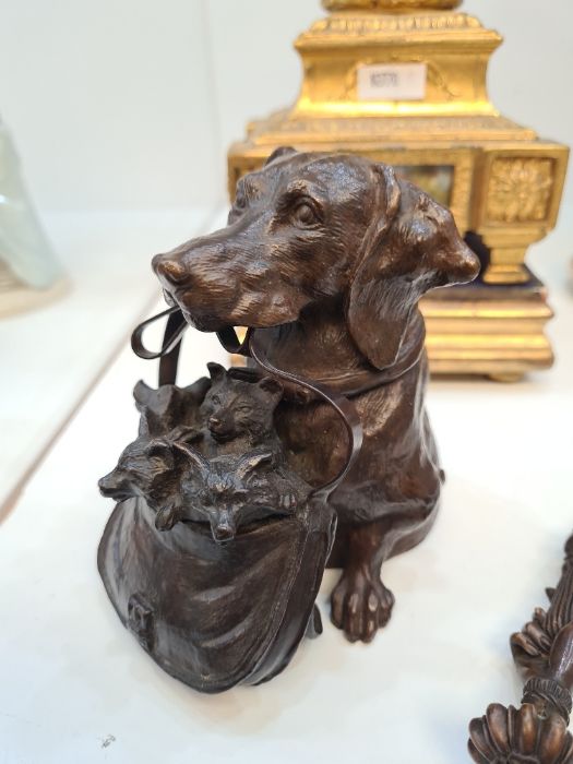 Geschutzt, an Austrian bronze inkwell in form of dog with satchel containing puppies stamped to reve