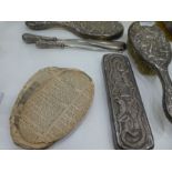 A selection of 1920s high grade Chinese silver, tested. Comprising of a silver shoe horn and lace pu