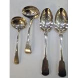 A pair of Georgian silver serving spoons hallmarked London 1834, John, Henry and Charles Lias. Also