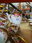 A quantity of Royal Chelsea 'Garden Rose' coffee and teaware for 6 (one teacup missing)