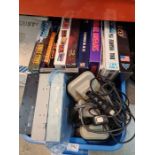 A quantity of vintage consoles and games to include a Commodore 600, ATARI 520STE, PS1 and selection