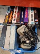 A quantity of vintage consoles and games to include a Commodore 600, ATARI 520STE, PS1 and selection