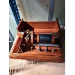 An old scientific instrument in mahogany box