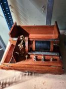 An old scientific instrument in mahogany box