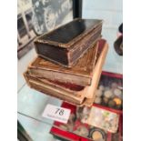 A small 17th Century Prayer book (1669), two other books and a notebook containing cigar labels