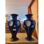 A pair of Royal Doulton stoneware vases having blue glaze (one A/F) 33.5cm