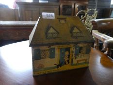 A vintage Crawford & Sons tin biscuit box having money box and lid with Lucie Atwell design of Bicky