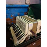 A Hohner Tango 1 piano accordion, in case