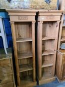 A pair of modern pine pillar bookcases, height 170cms and width 52cms