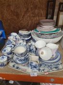 A selection of mostly blue and white transfer print china mark to the base an interlocking CF, etc