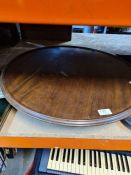 A large mahogany Lazy Susan and two trays