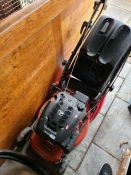 A Mountfield RM55 160cc petrol lawn mower and a box of tools
