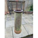 A terracotta chimney pot